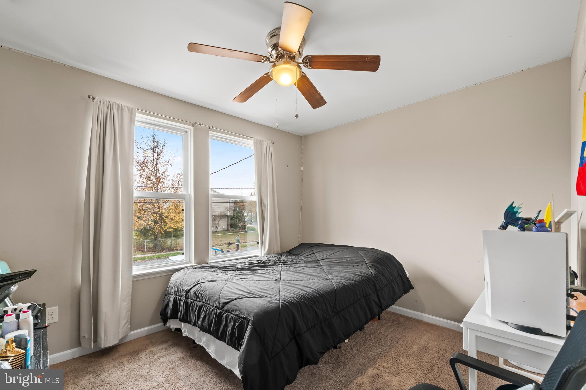 208 Pelham Road South Voorhees, NJ 08043 - Photo 16 of 33 a bedroom with a bed and a window