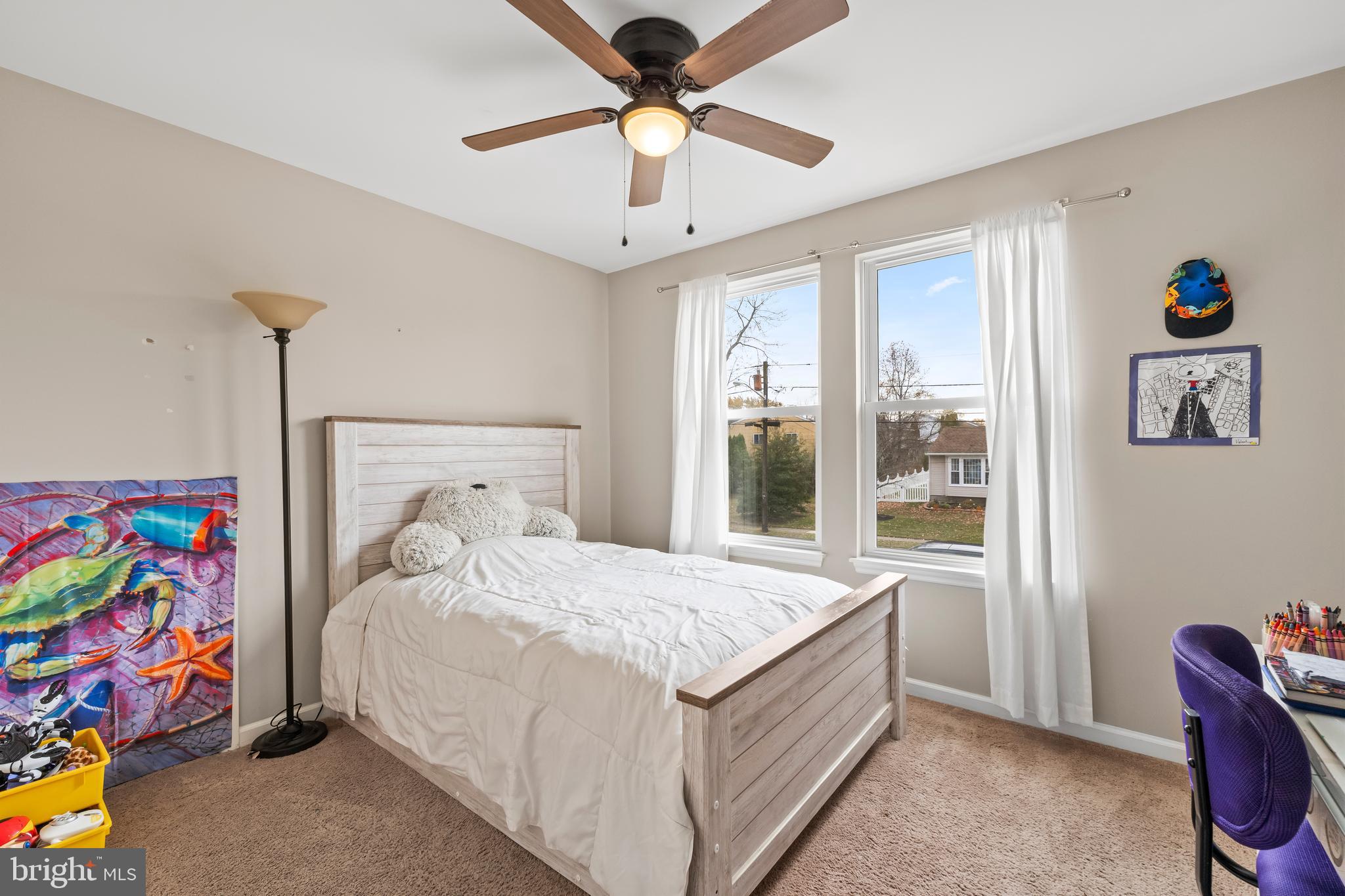 208 Pelham Road South Voorhees, NJ 08043 - Photo 17 of 33 a bedroom with a bed and a chandelier