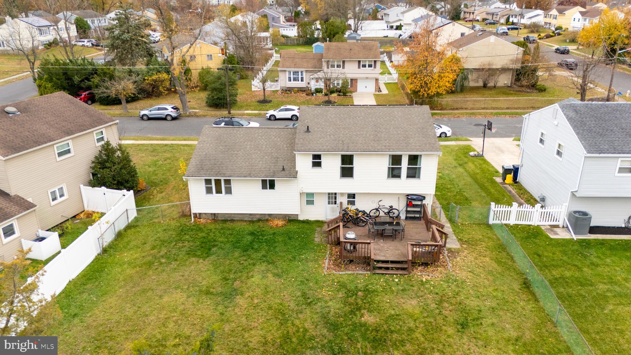 208 Pelham Road South Voorhees, NJ 08043 - Photo 26 of 33 a aerial view of a house with swimming pool lawn chairs and a yard