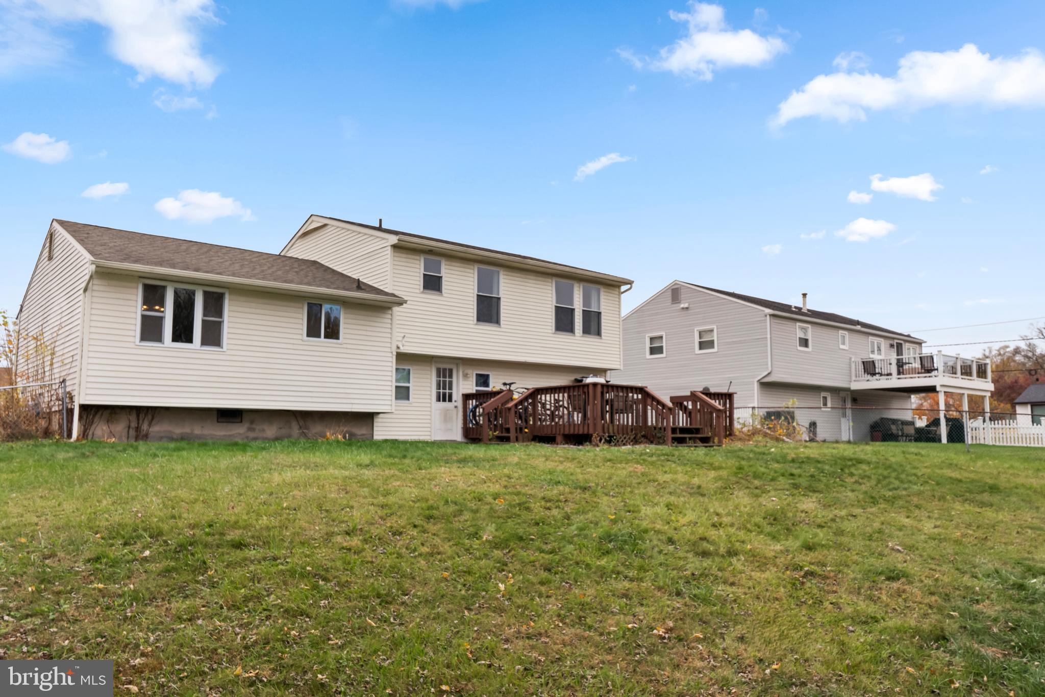208 Pelham Road South Voorhees, NJ 08043 - Photo 31 of 33 a view of a house with a backyard