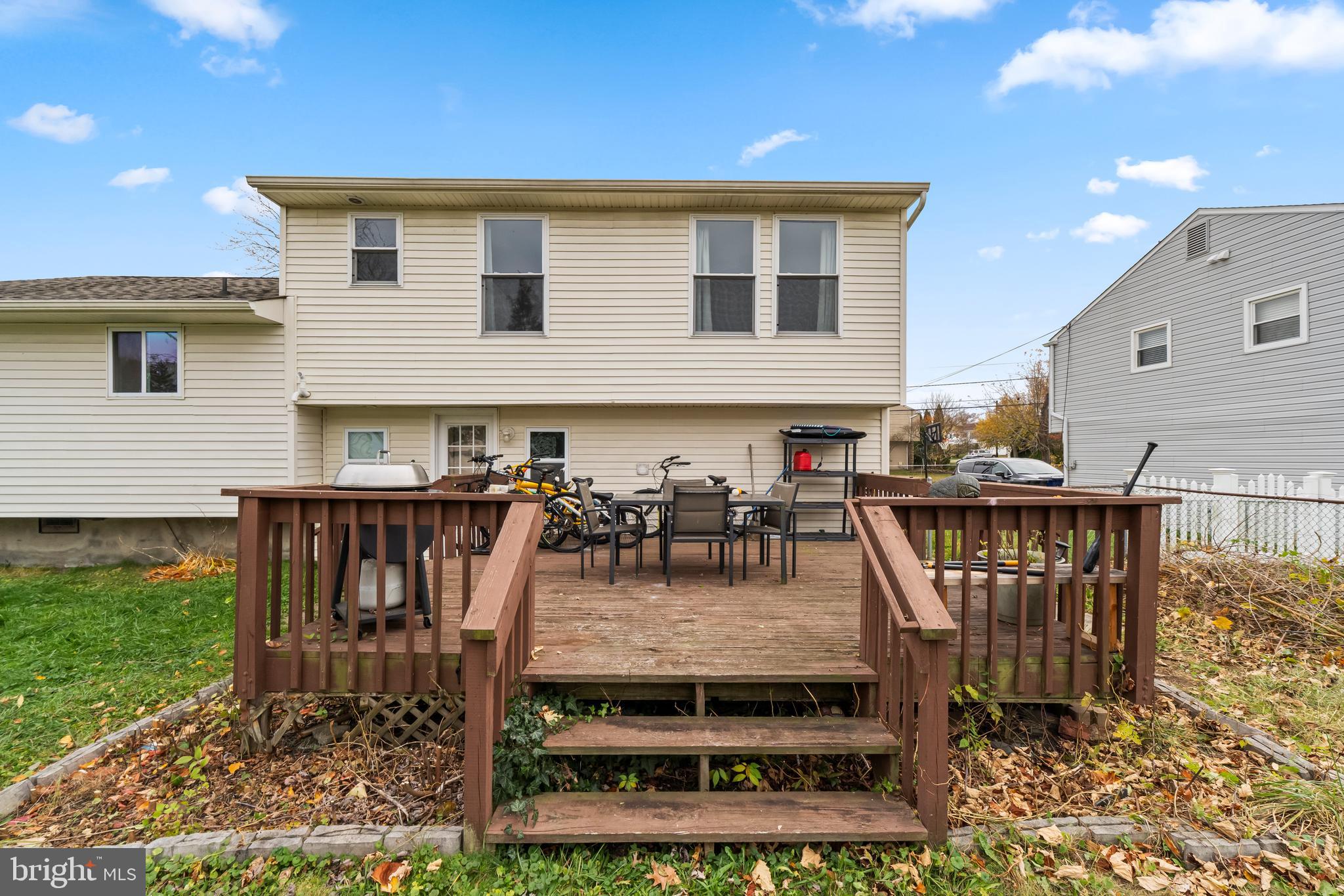 208 Pelham Road South Voorhees, NJ 08043 - Photo 33 of 33 a view of a house with wooden deck and furniture
