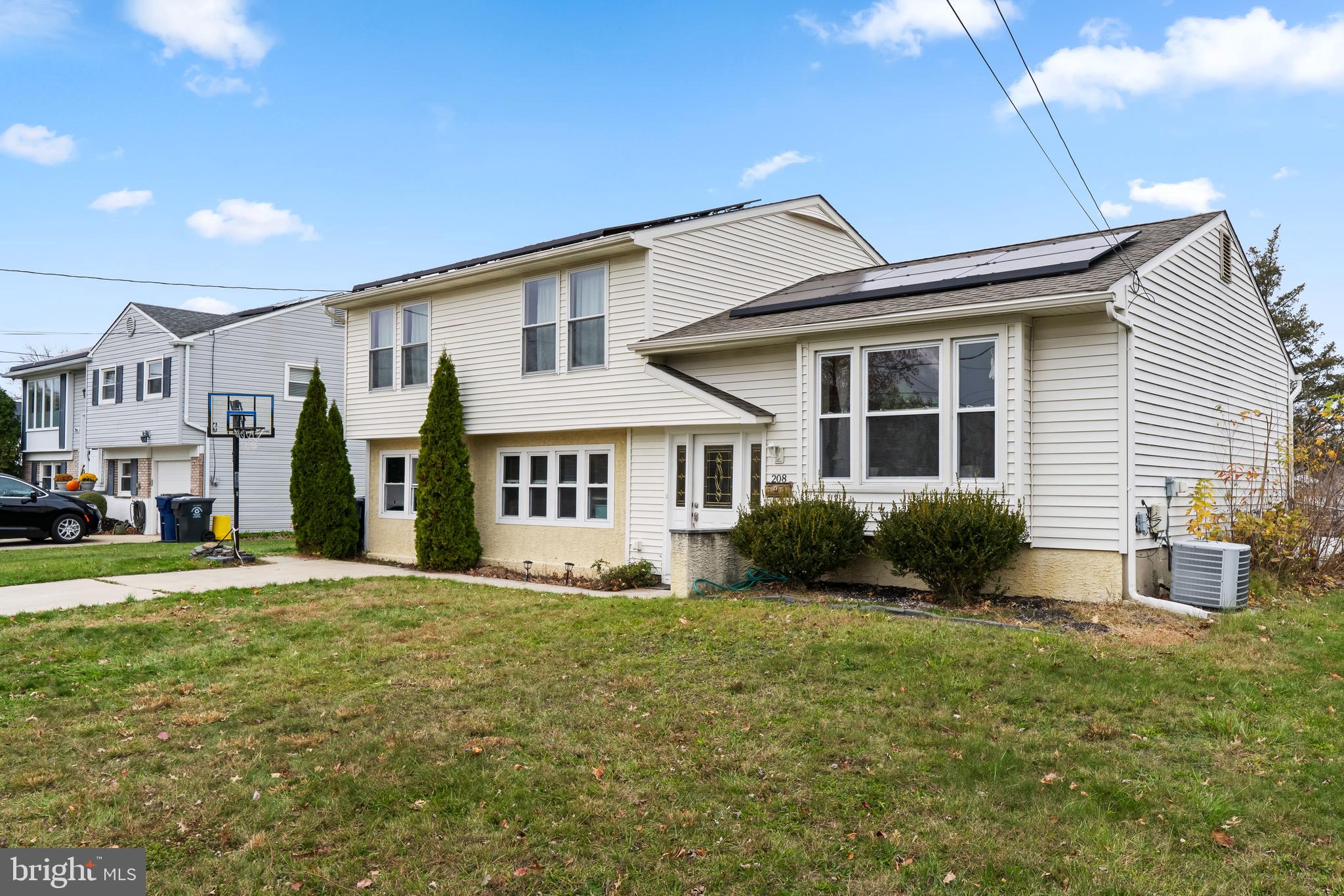 208 Pelham Road South Voorhees, NJ 08043 - Photo 4 of 33 a front view of a house with a yard