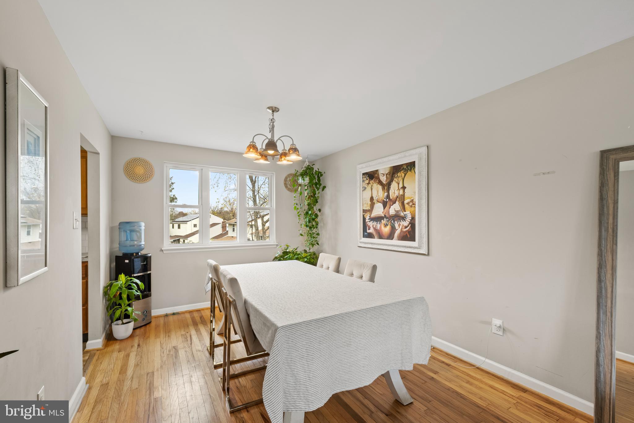 208 Pelham Road South Voorhees, NJ 08043 - Photo 10 of 33 a view of a dining room with furniture window and wooden floor