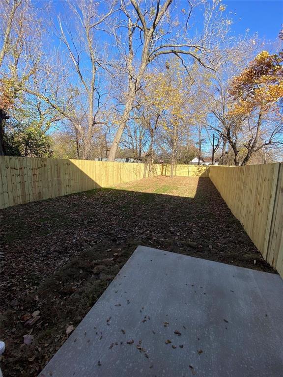 131 East Bond Street Denison, TX 75021 - Photo 10 of 10 a view of an outdoor space with a lake view