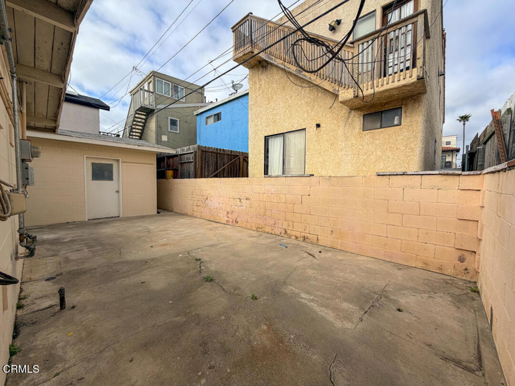 313 Highland Drive Oxnard, CA 93035 - Photo 14 of 16 a view of a white house with a street