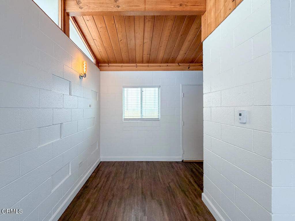 313 Highland Drive Oxnard, CA 93035 - Photo 5 of 16 a view of a small space with wooden floor and a window