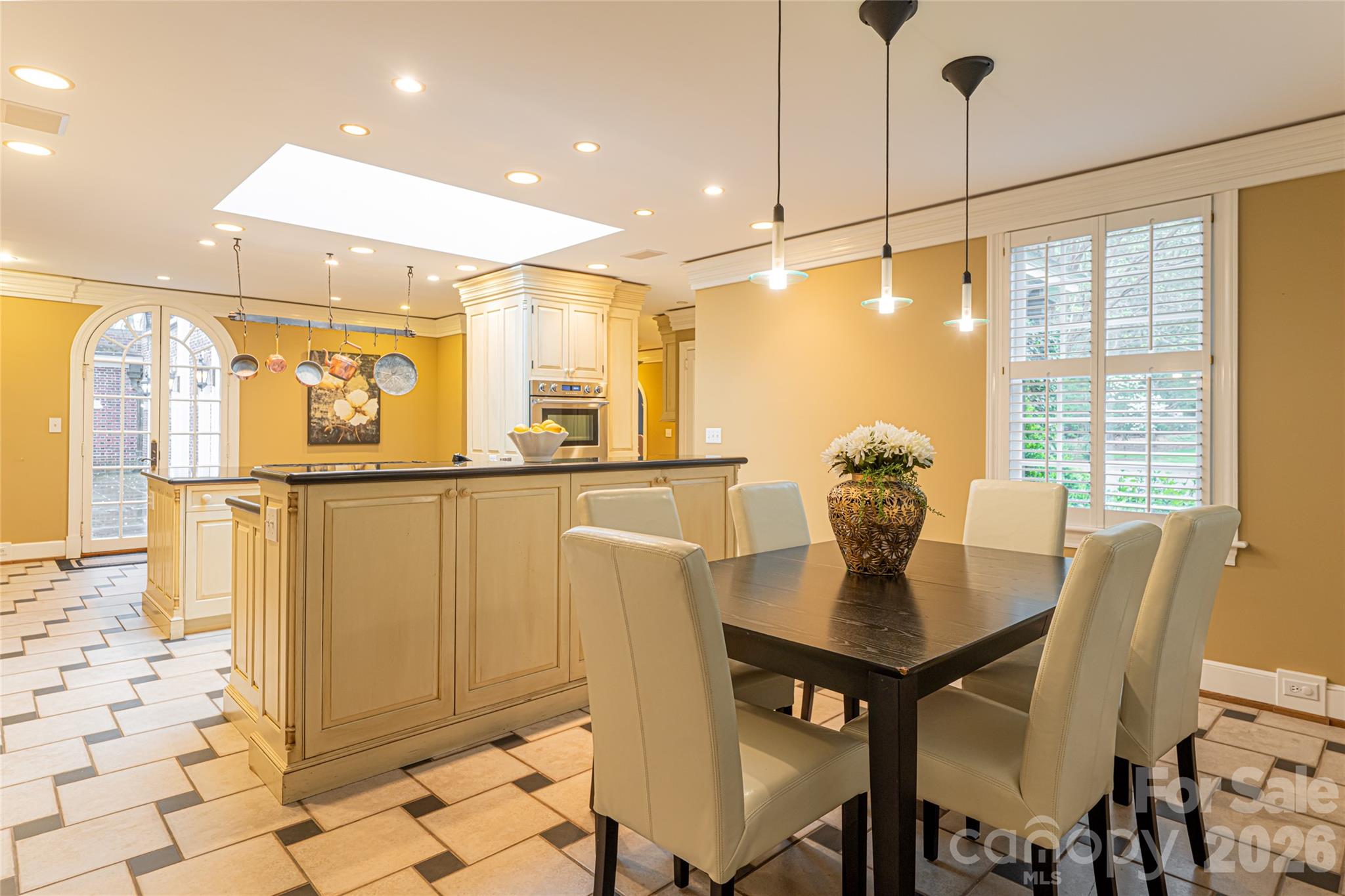 31 Busbee Road Asheville, NC 28803 - Photo 25 of 48 a view of a dining room with furniture window and outside view