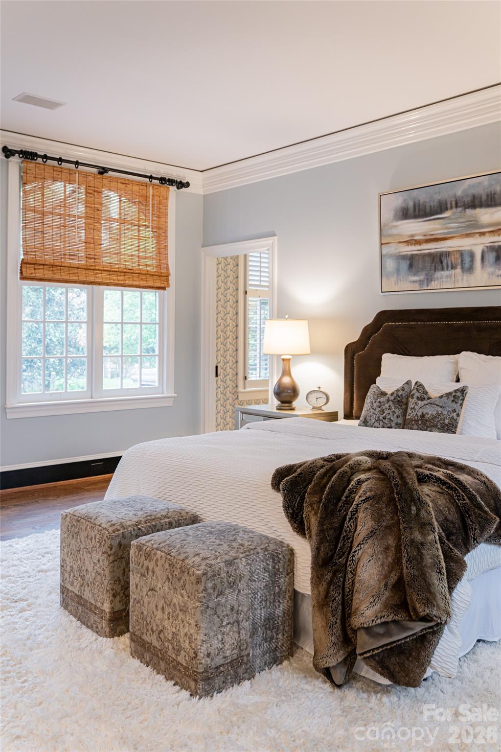 31 Busbee Road Asheville, NC 28803 - Photo 28 of 48 a bedroom with a bed and a large window