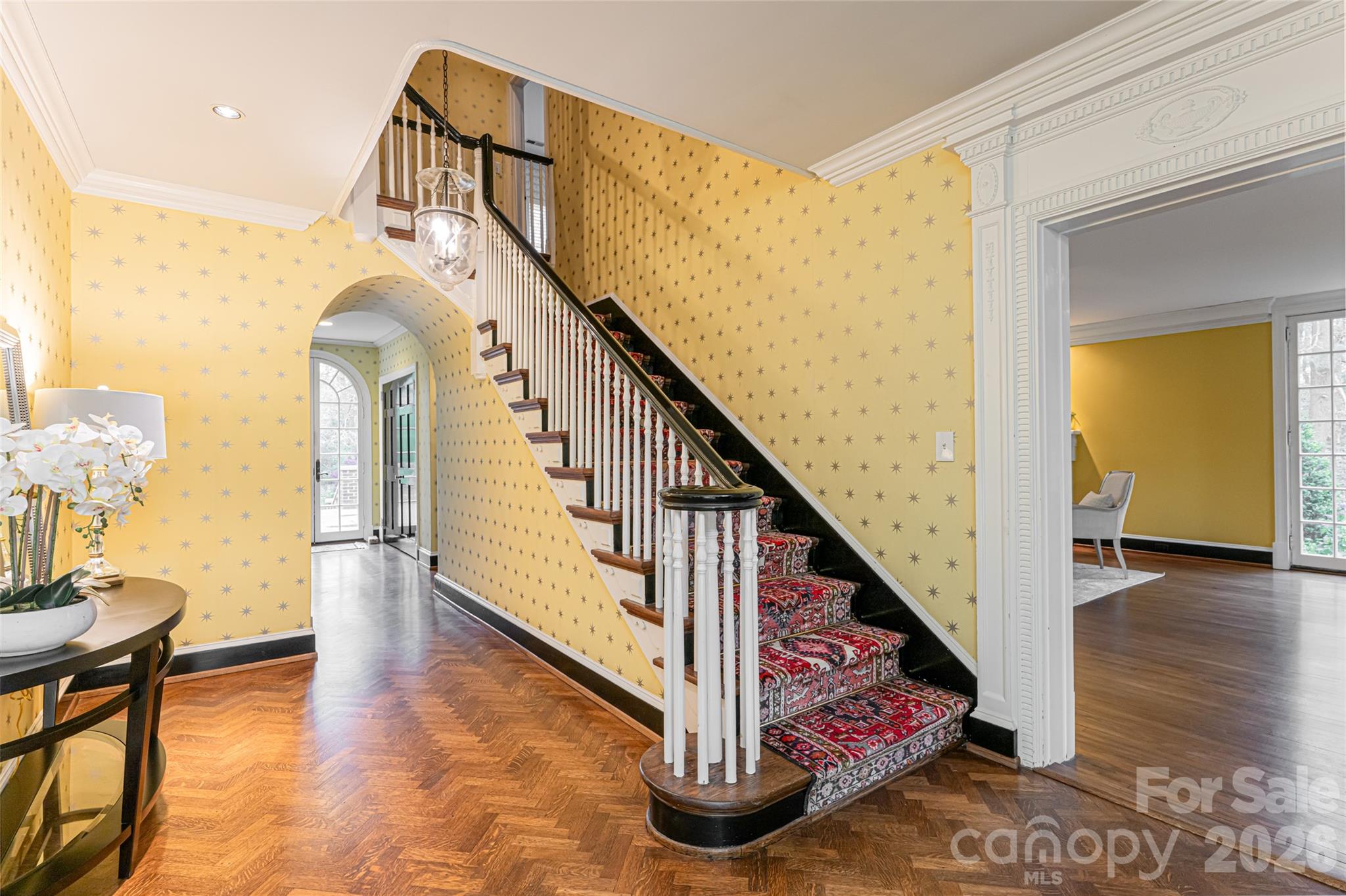 31 Busbee Road Asheville, NC 28803 - Photo 4 of 48 a view of entryway and hall with wooden floor