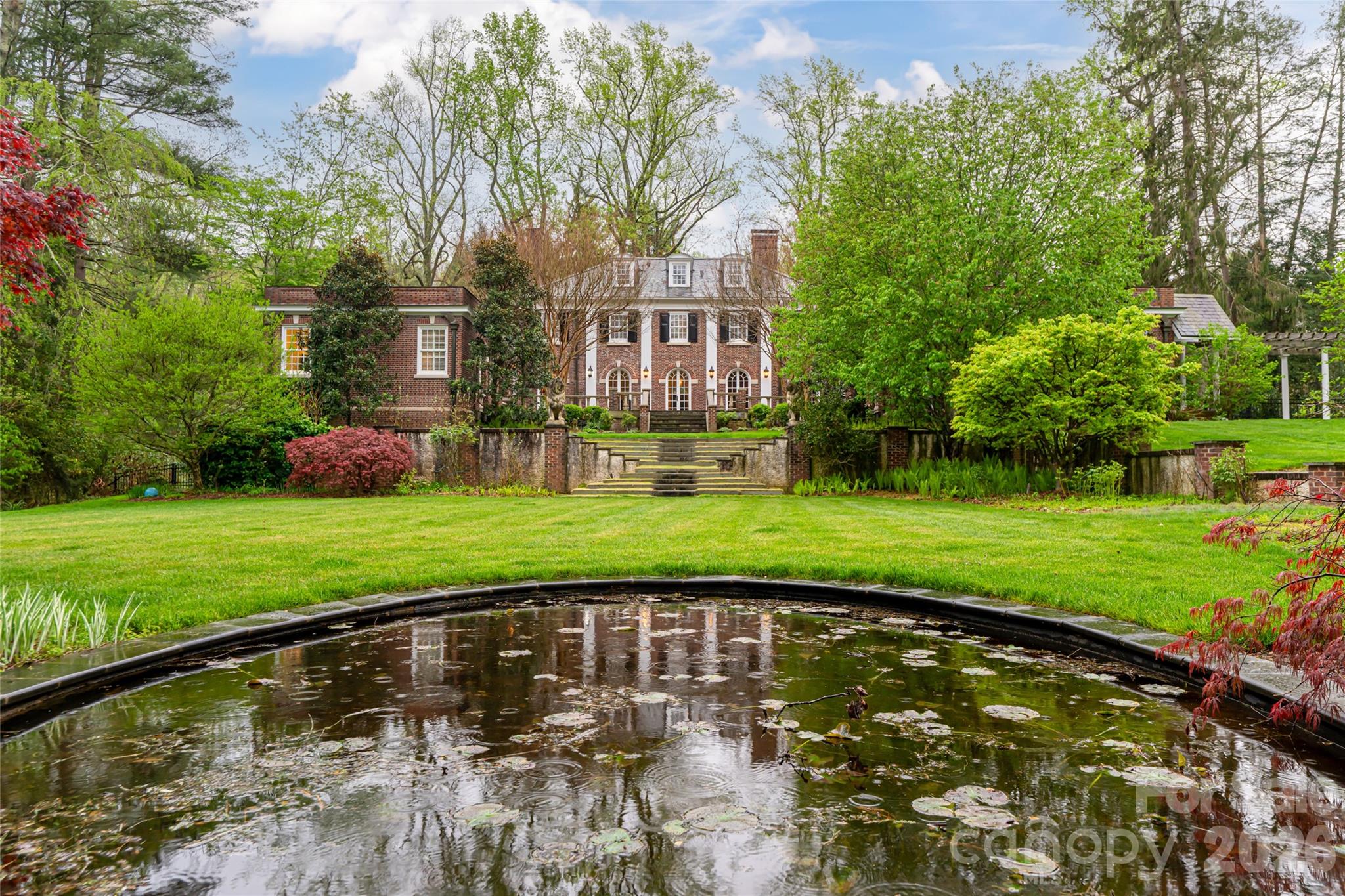 31 Busbee Road Asheville, NC 28803 - Photo 47 of 48 a view of lake with a building in the background