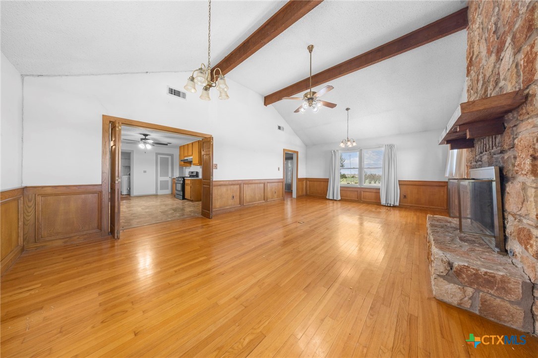 12558 Guyton Road Troy, TX 76579 - Photo 7 of 32 a view of a living room with wooden floor