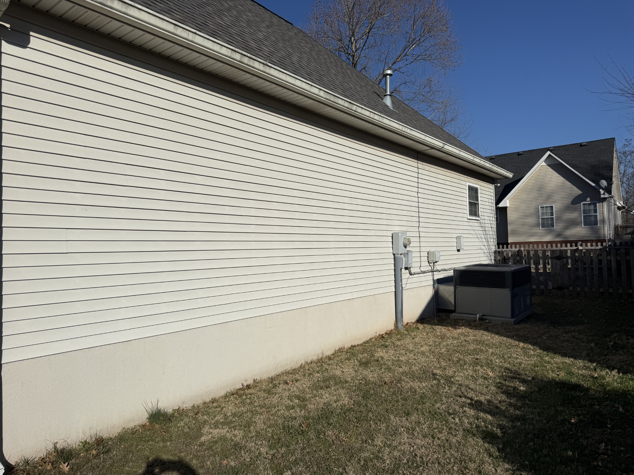 128 Fieldstone Lane Springfield, TN 37172 - Photo 5 of 8 a back view of a house with a yard