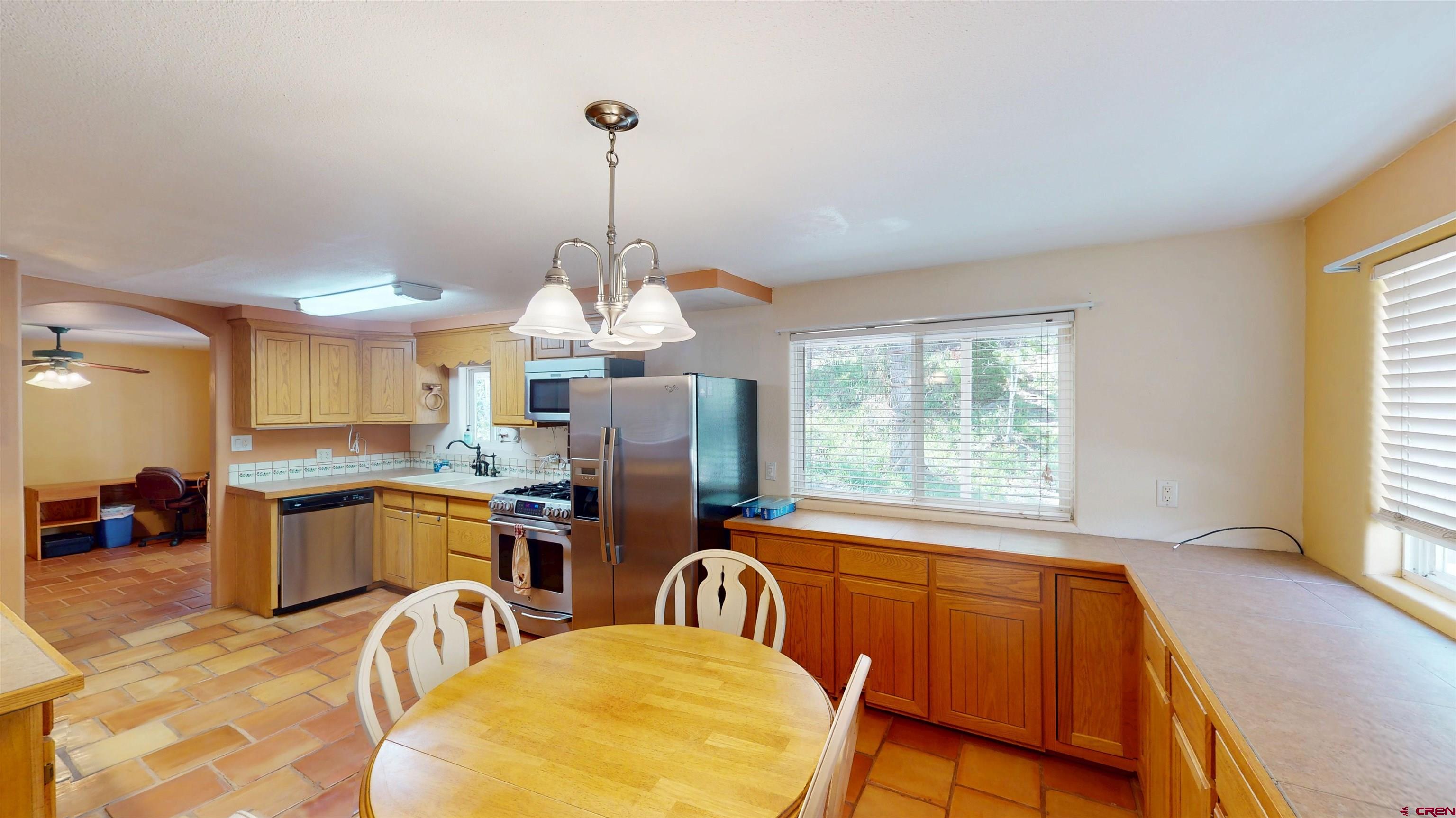100 Rio Grande Avenue Paonia, CO 81428 - Photo 15 of 45 a view of a kitchen and dining room