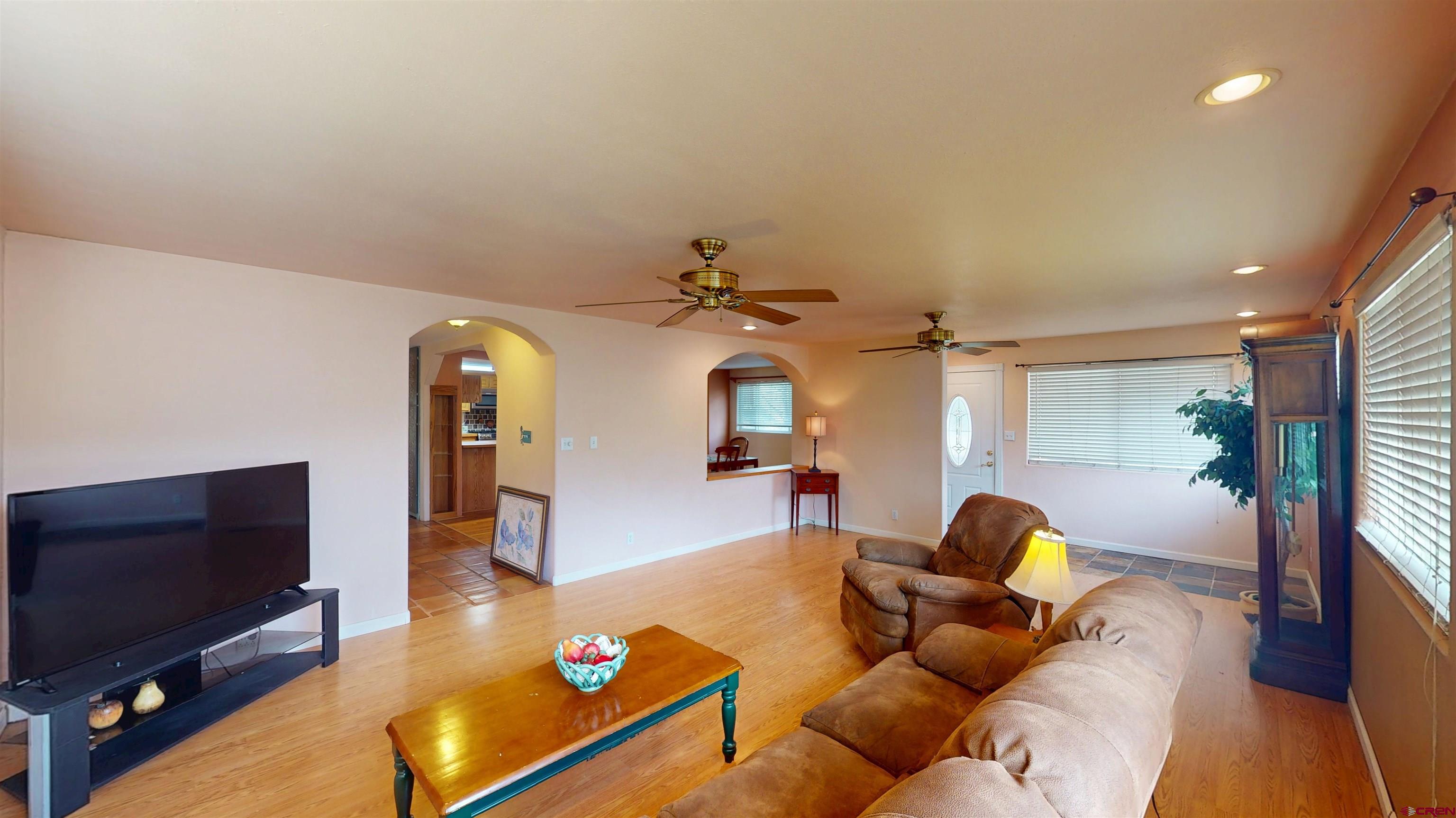 100 Rio Grande Avenue Paonia, CO 81428 - Photo 19 of 45 a living room with furniture and a flat screen tv