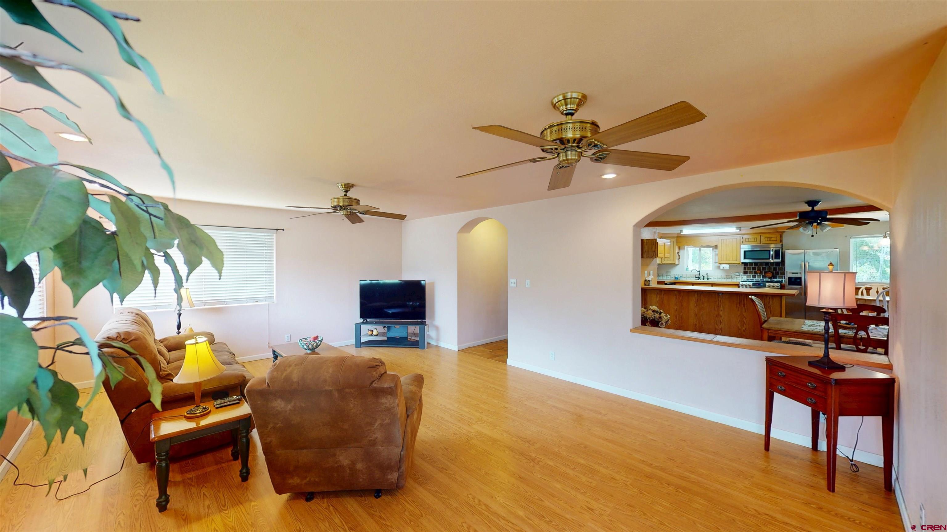 100 Rio Grande Avenue Paonia, CO 81428 - Photo 21 of 45 a living room with furniture and a fireplace