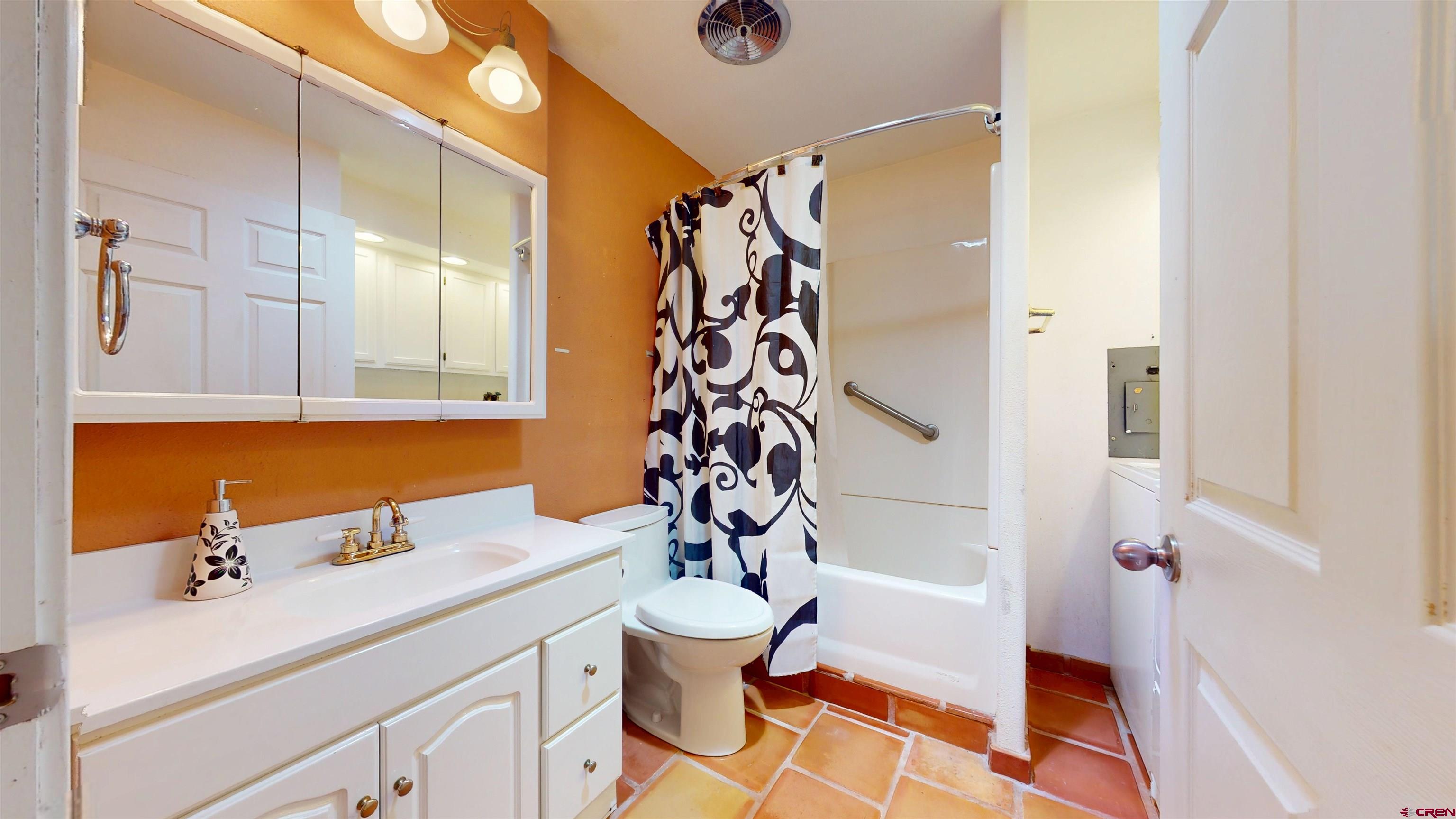 100 Rio Grande Avenue Paonia, CO 81428 - Photo 31 of 45 a bathroom with a sink toilet and shower