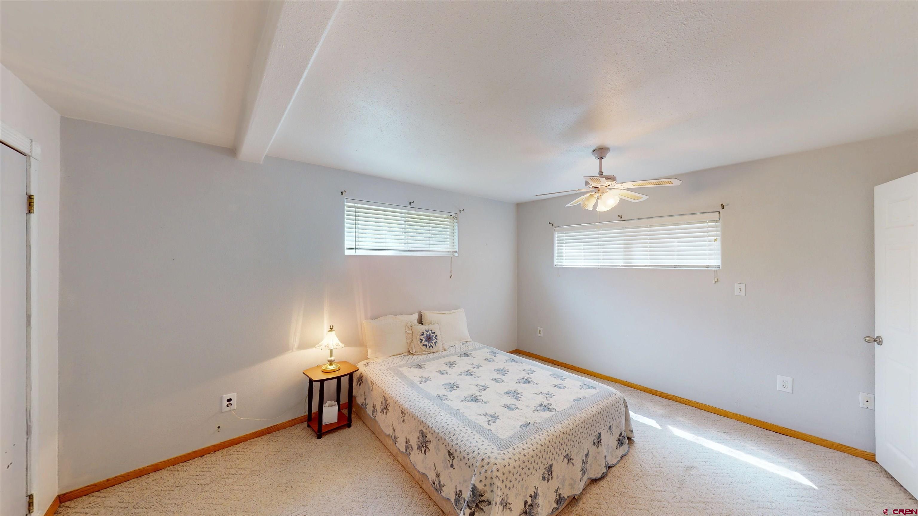 100 Rio Grande Avenue Paonia, CO 81428 - Photo 36 of 45 a bedroom with a bed and a window