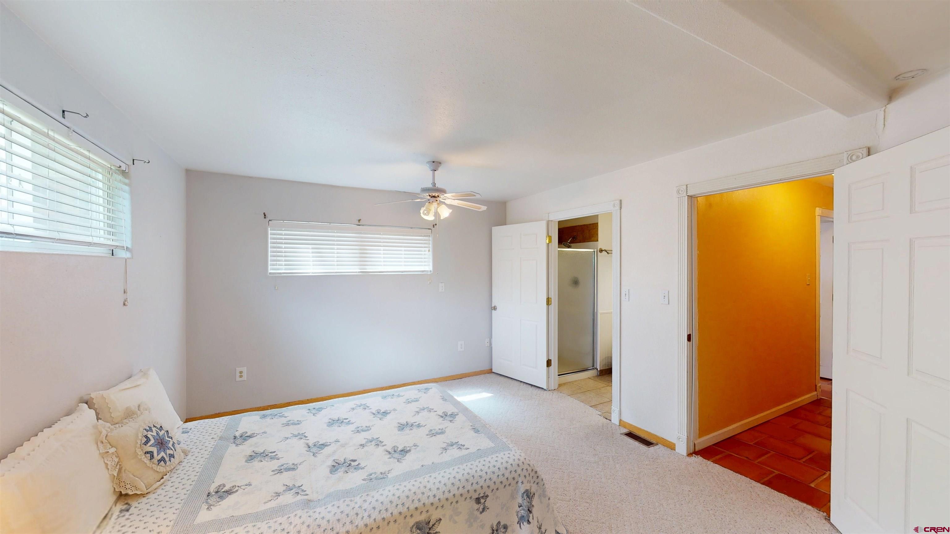 100 Rio Grande Avenue Paonia, CO 81428 - Photo 37 of 45 a bedroom with a bed and a window