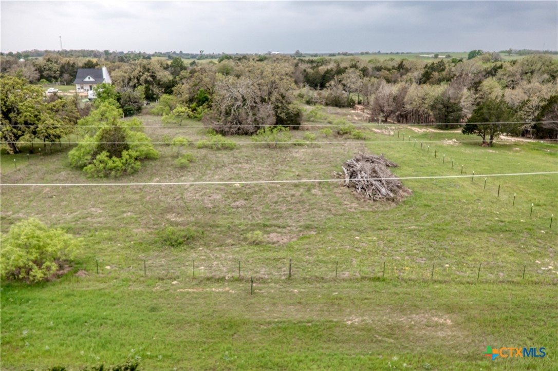 0 Eely Road McDade, TX 78650 - Photo 1 of 4 a view of a field with an ocean
