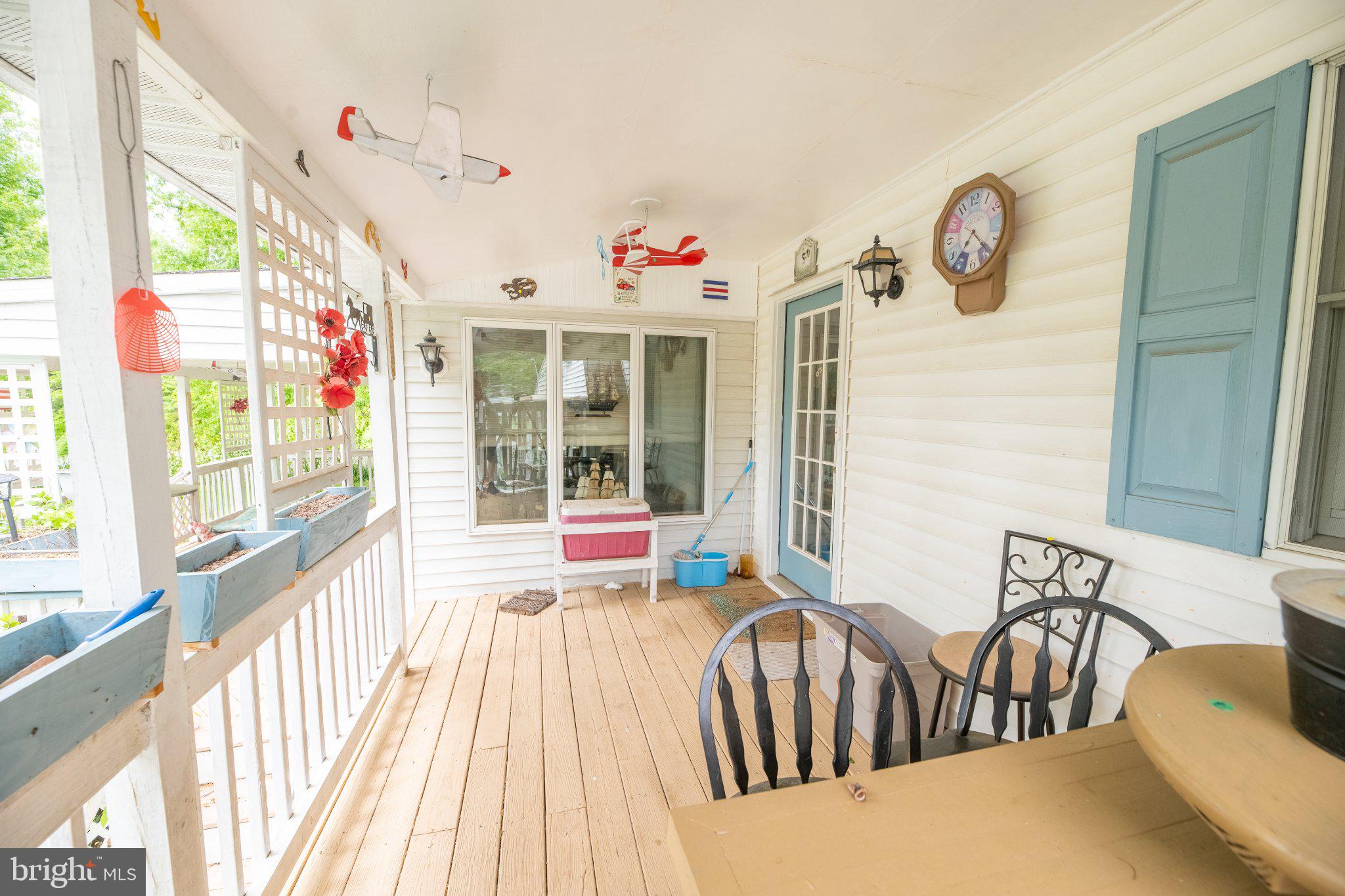 57 Diverty Road Pennington, NJ 08534 - Photo 65 of 86 Charming porch with playful decor.