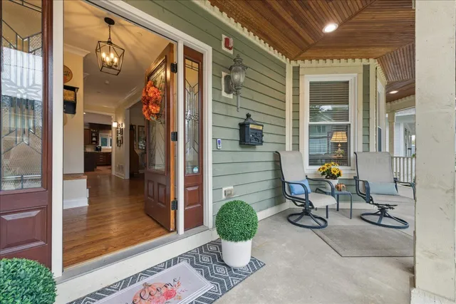 a view of a porch with seating space