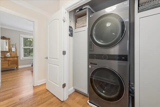 a view of a hallway with washer and dryer