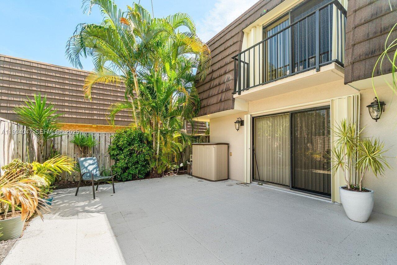 1619 16th Court Jupiter, FL 33477 - Photo 5 of 31 a view of a house with a patio
