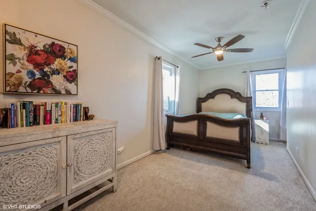 a bedroom with furniture and a window