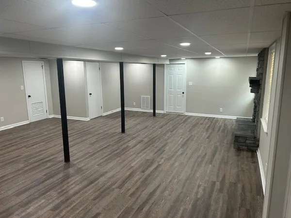 a view of wooden floor in an empty room