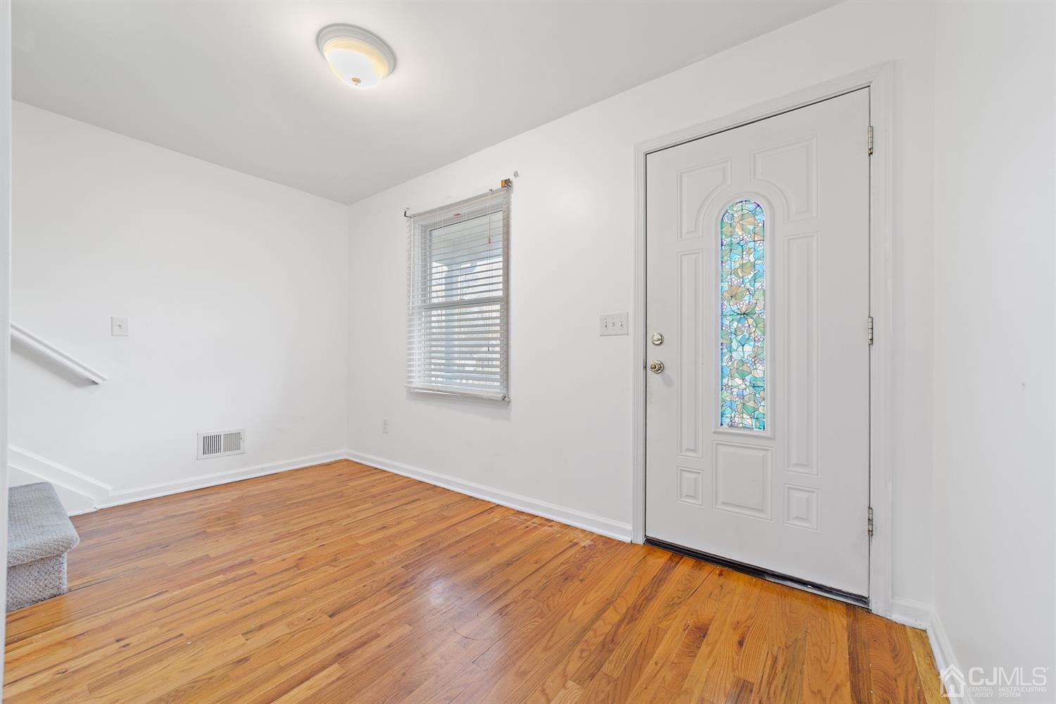 66 Helmetta Road Monroe Township, NJ 08831 - Photo 3 of 25 an empty room with window