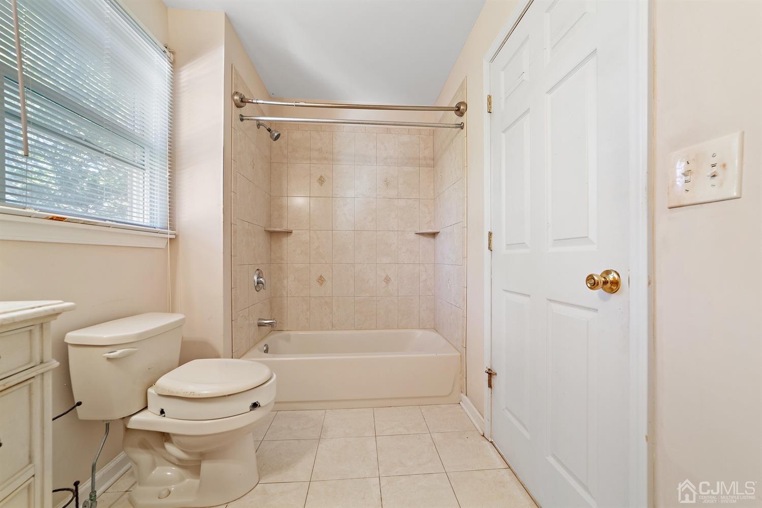 66 Helmetta Road Monroe Township, NJ 08831 - Photo 21 of 25 a bathroom with a toilet and a shower