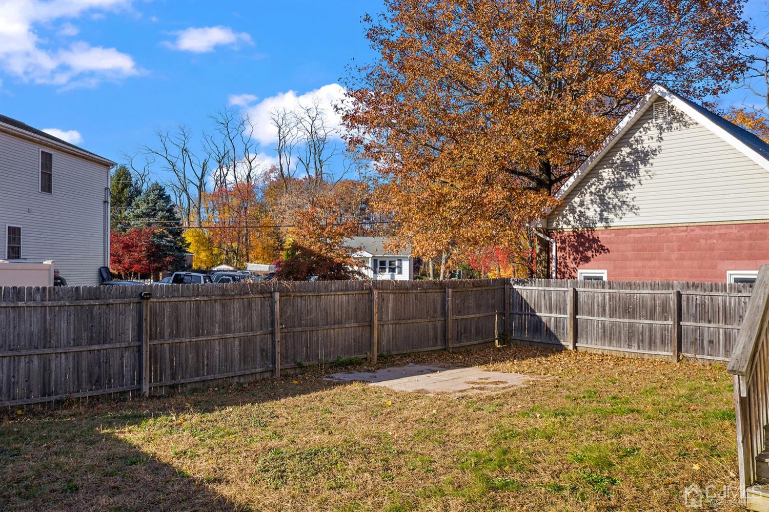66 Helmetta Road Monroe Township, NJ 08831 - Photo 25 of 25 a view of backyard with wooden fence