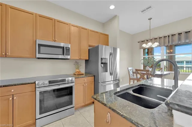 $449,900 | 21536 Taft Court, Unit 203, Estero, FL 33928