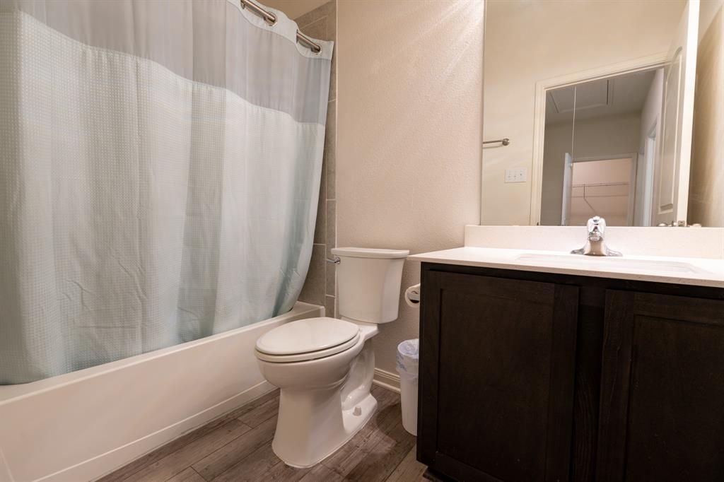 208 Liberty Lane Venus, TX 76084 - Photo 19 of 29 Second Bathroom With Single Vanity Sink & Bath Tub/Shower
