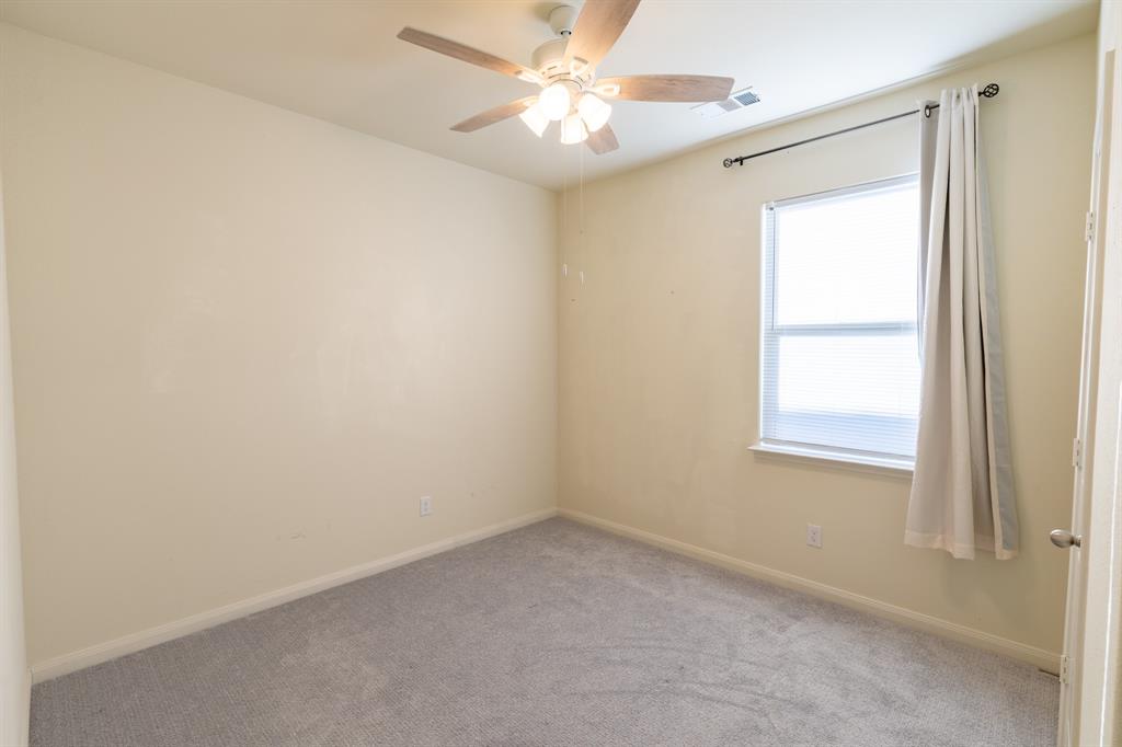 208 Liberty Lane Venus, TX 76084 - Photo 20 of 29 Third Bedroom With Ceiling Fan & Carpet