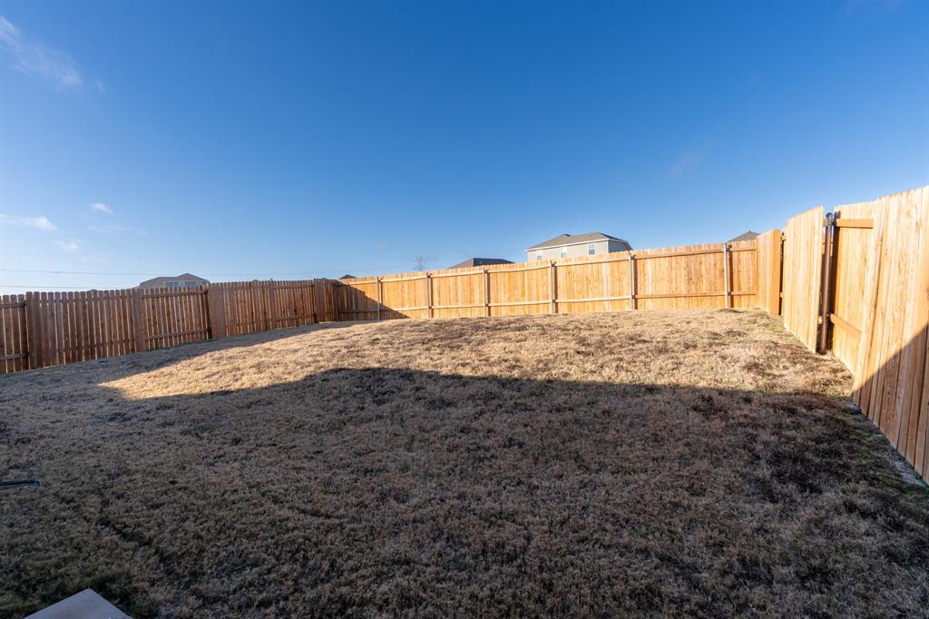 208 Liberty Lane Venus, TX 76084 - Photo 27 of 29 View of Fenced-in Backyard