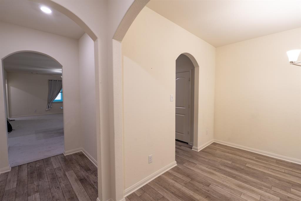 208 Liberty Lane Venus, TX 76084 - Photo 5 of 29 Entry Hall Facing the Dining Room and Living Room