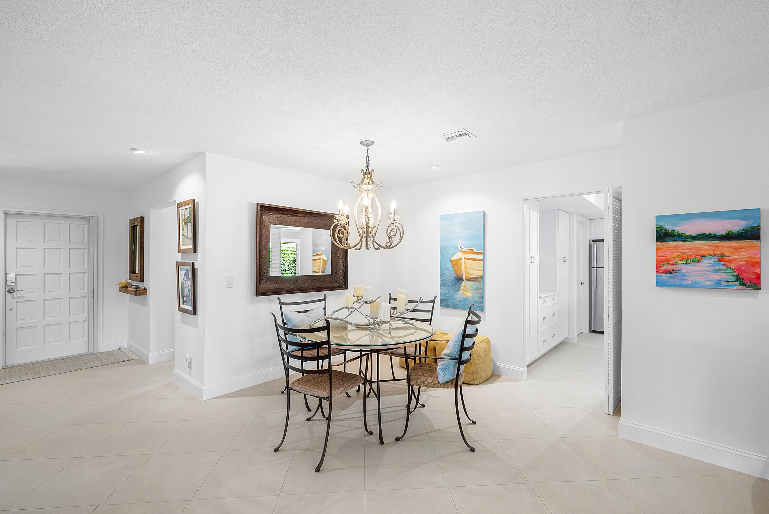 481 Forestview Drive Atlantis, FL 33462 - Photo 14 of 68 a view of a dining room with furniture