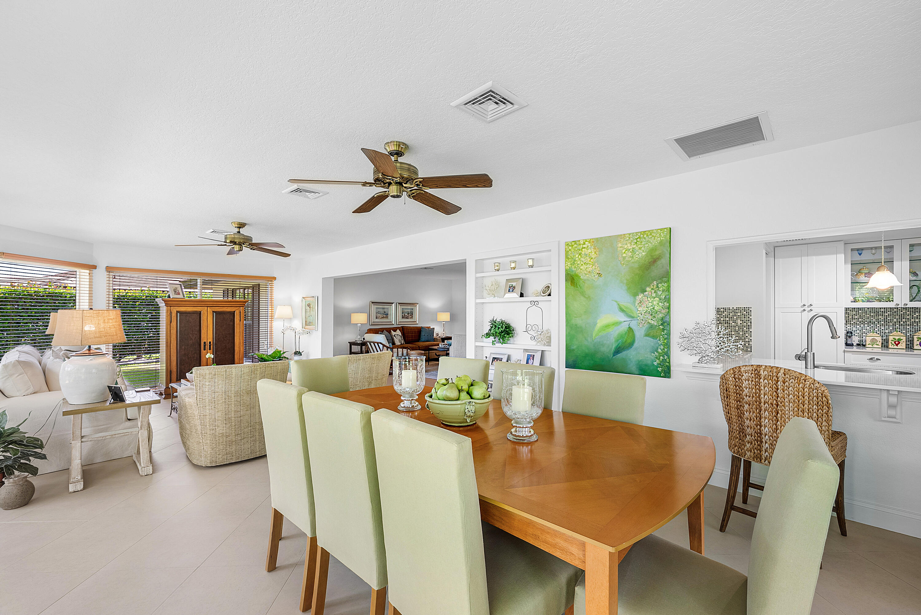 481 Forestview Drive Atlantis, FL 33462 - Photo 24 of 68 a view of a dining room with furniture window and outside view