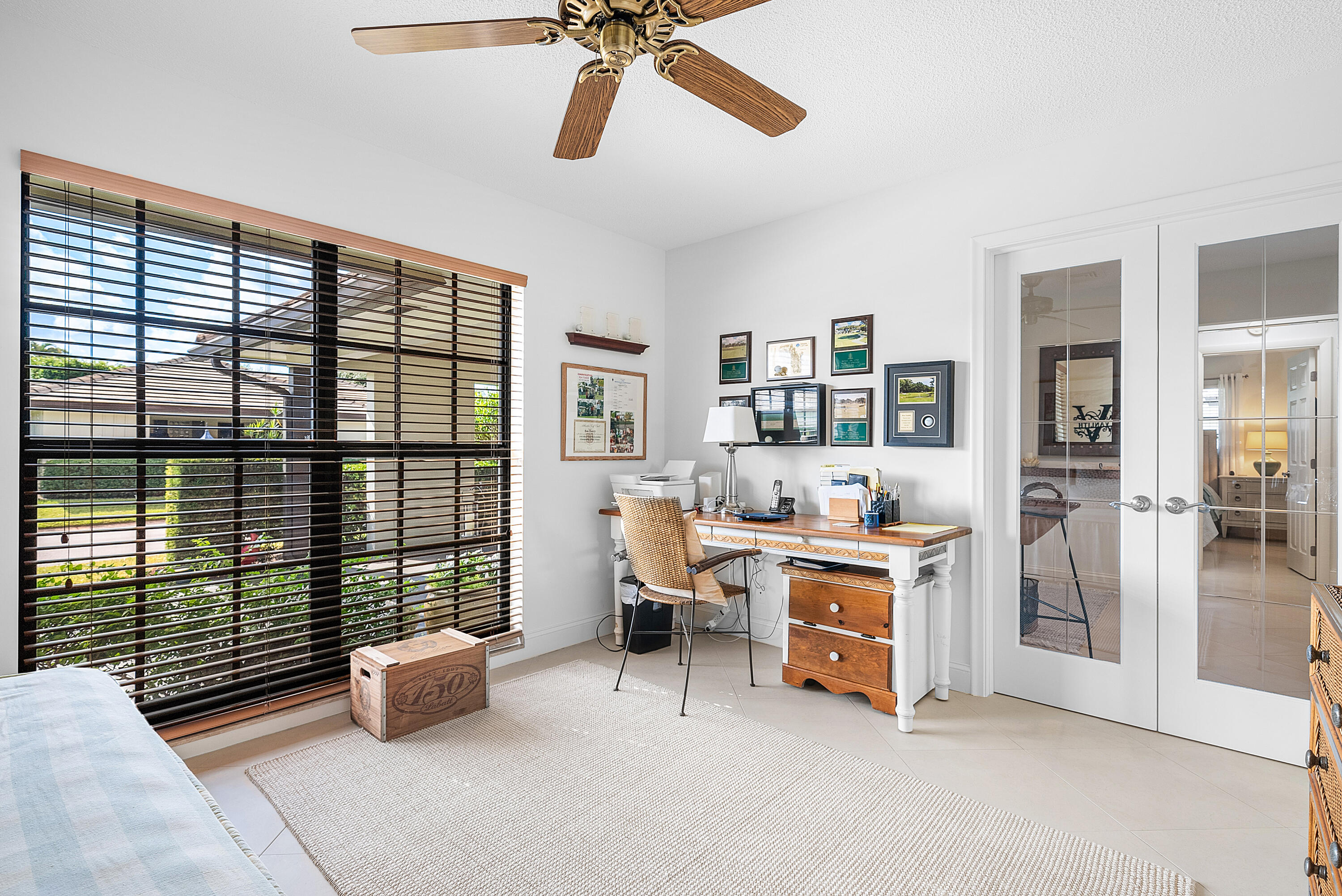 481 Forestview Drive Atlantis, FL 33462 - Photo 36 of 68 a view of a livingroom with workspace and a window