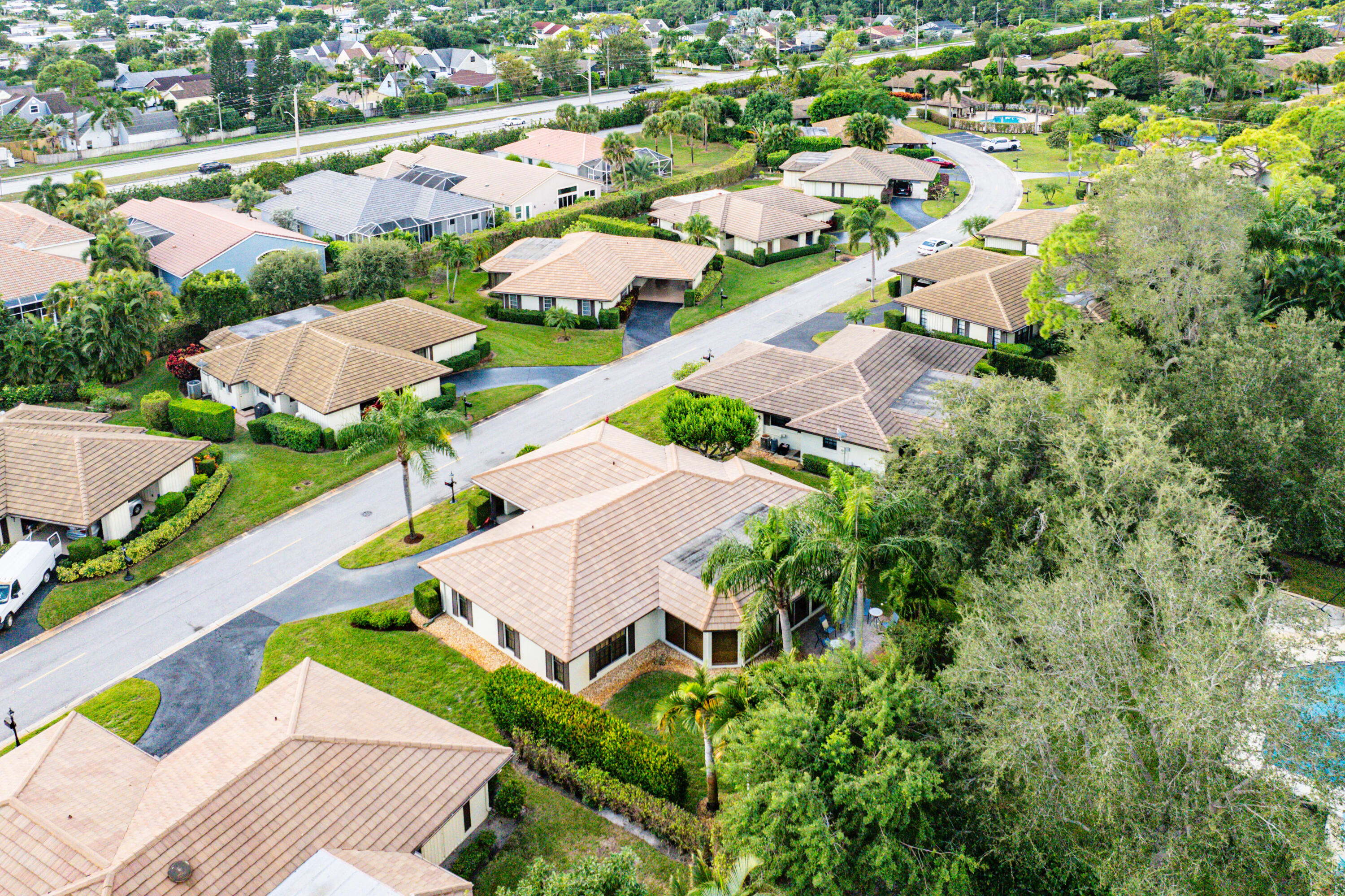 481 Forestview Drive Atlantis, FL 33462 - Photo 56 of 68 an aerial view of residential houses with outdoor space