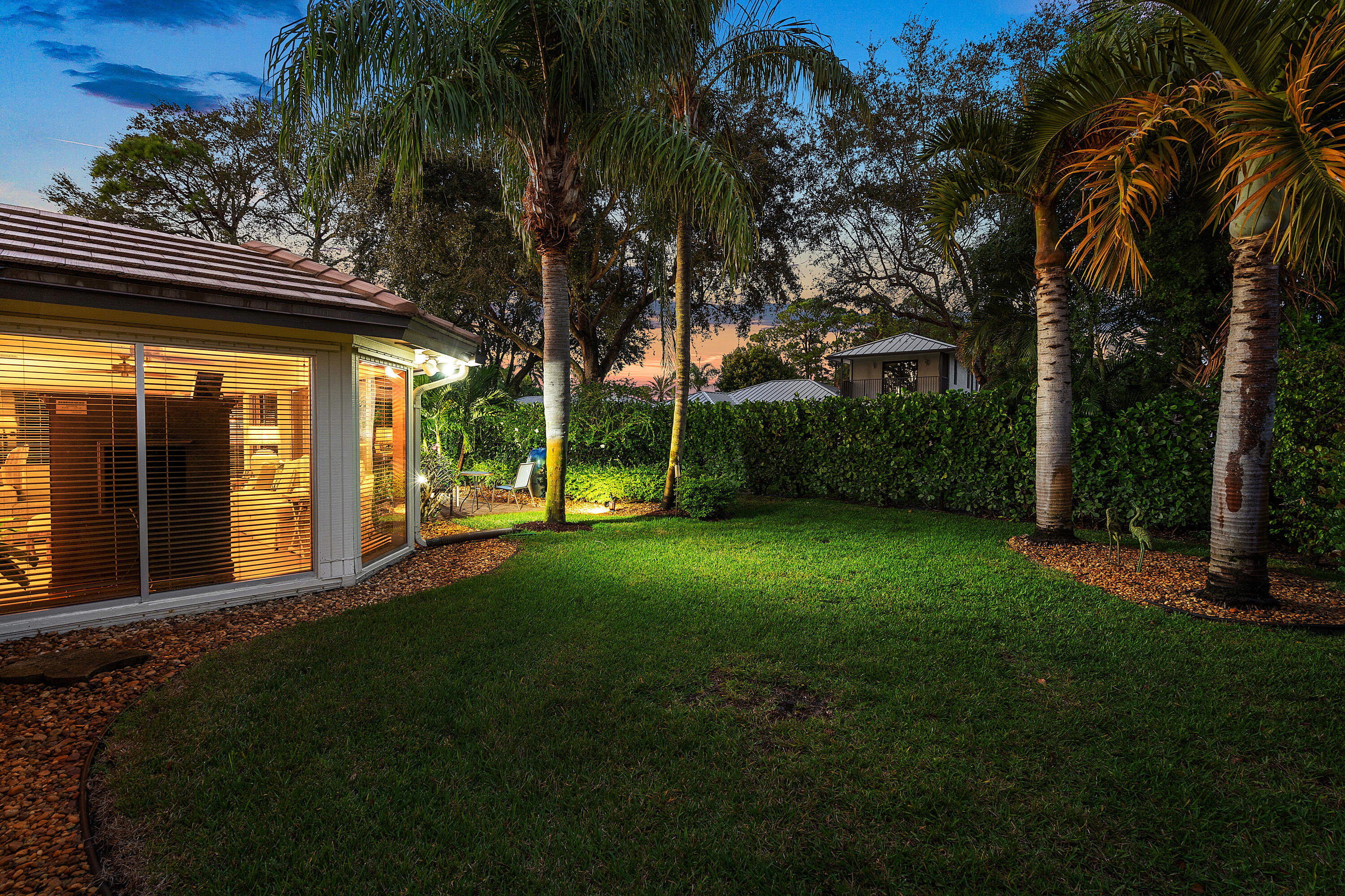 481 Forestview Drive Atlantis, FL 33462 - Photo 62 of 68 a view of a house with a backyard