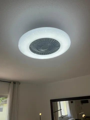 a bedroom with a bed and a closet