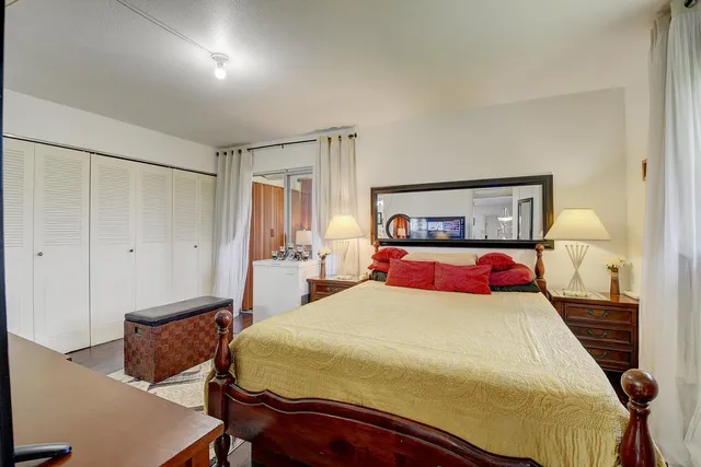 a view of a house with a yard from a balcony