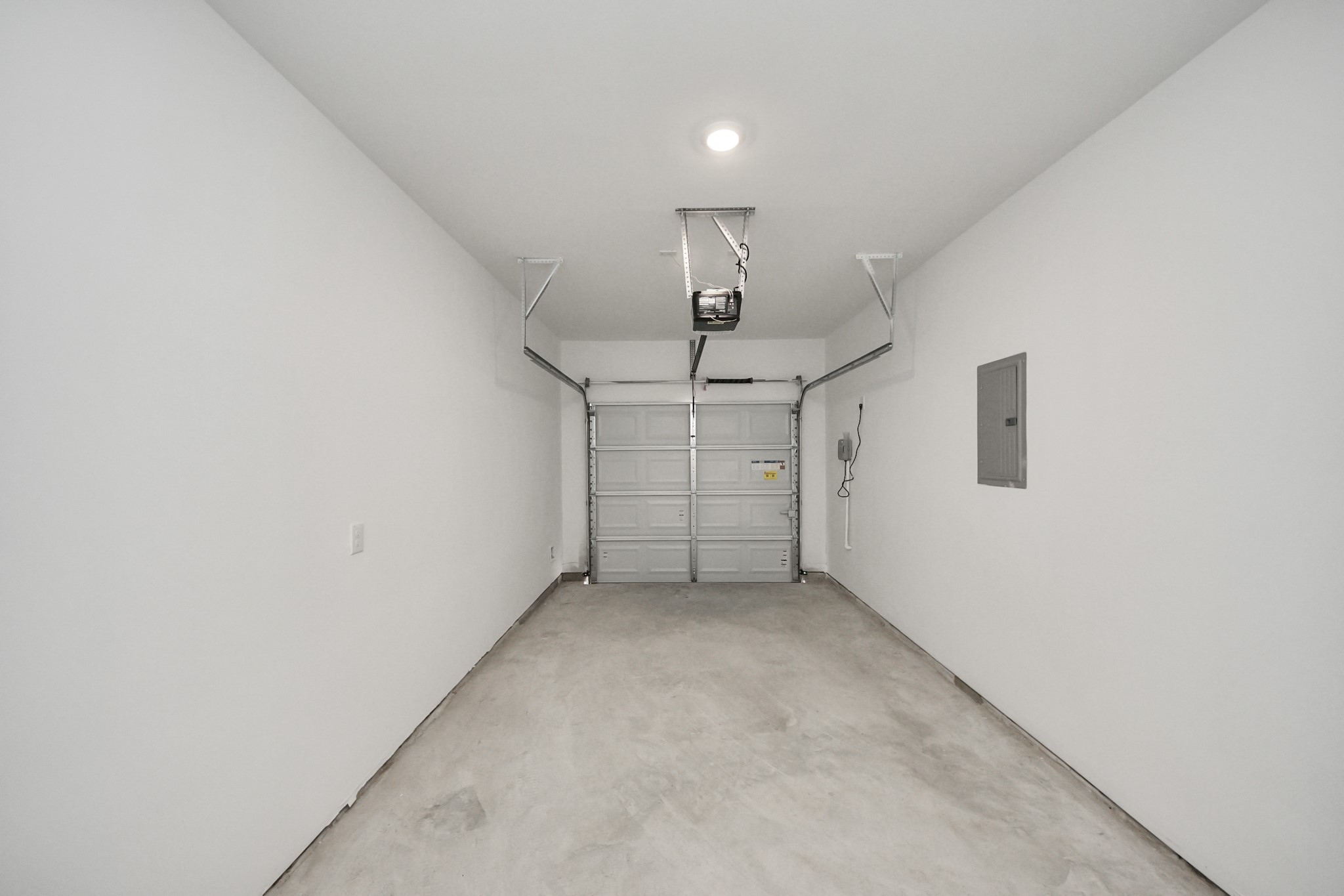 1006 Moon Drop Lane Houston, TX 77090 - Photo 18 of 38 an empty room with chandelier fan