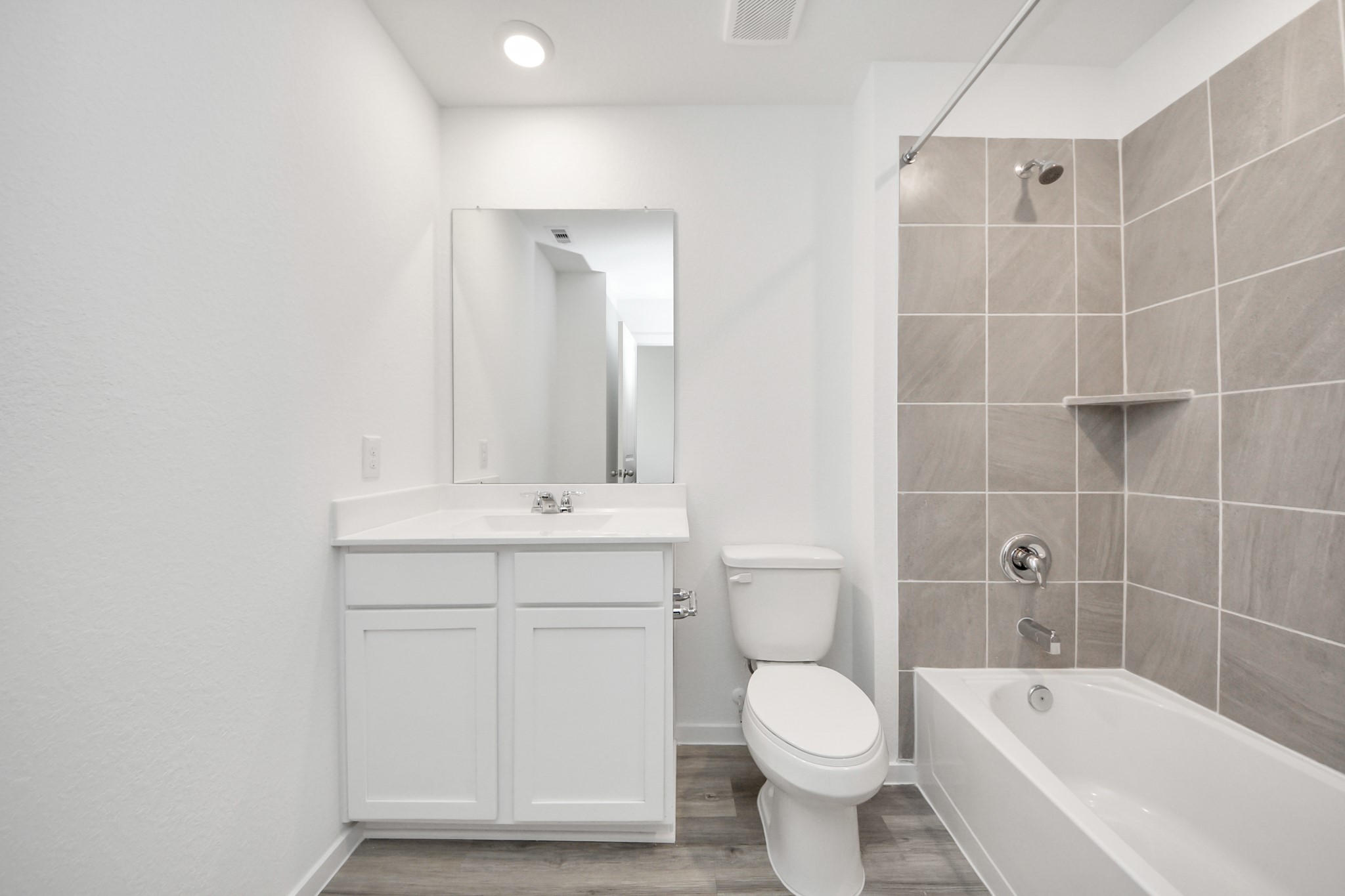 1006 Moon Drop Lane Houston, TX 77090 - Photo 27 of 38 a bathroom with a sink toilet and shower