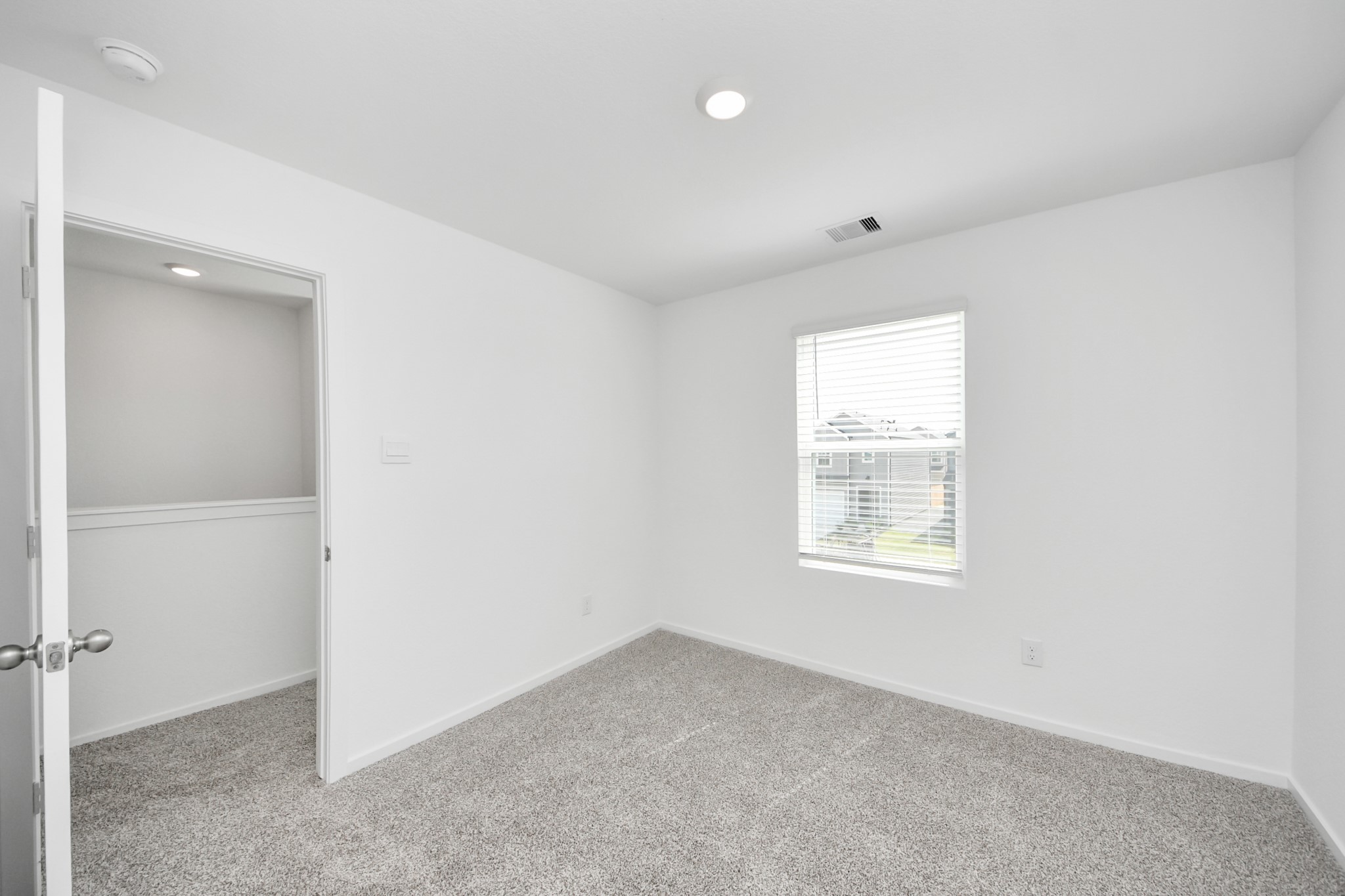 1006 Moon Drop Lane Houston, TX 77090 - Photo 30 of 38 an empty room with windows