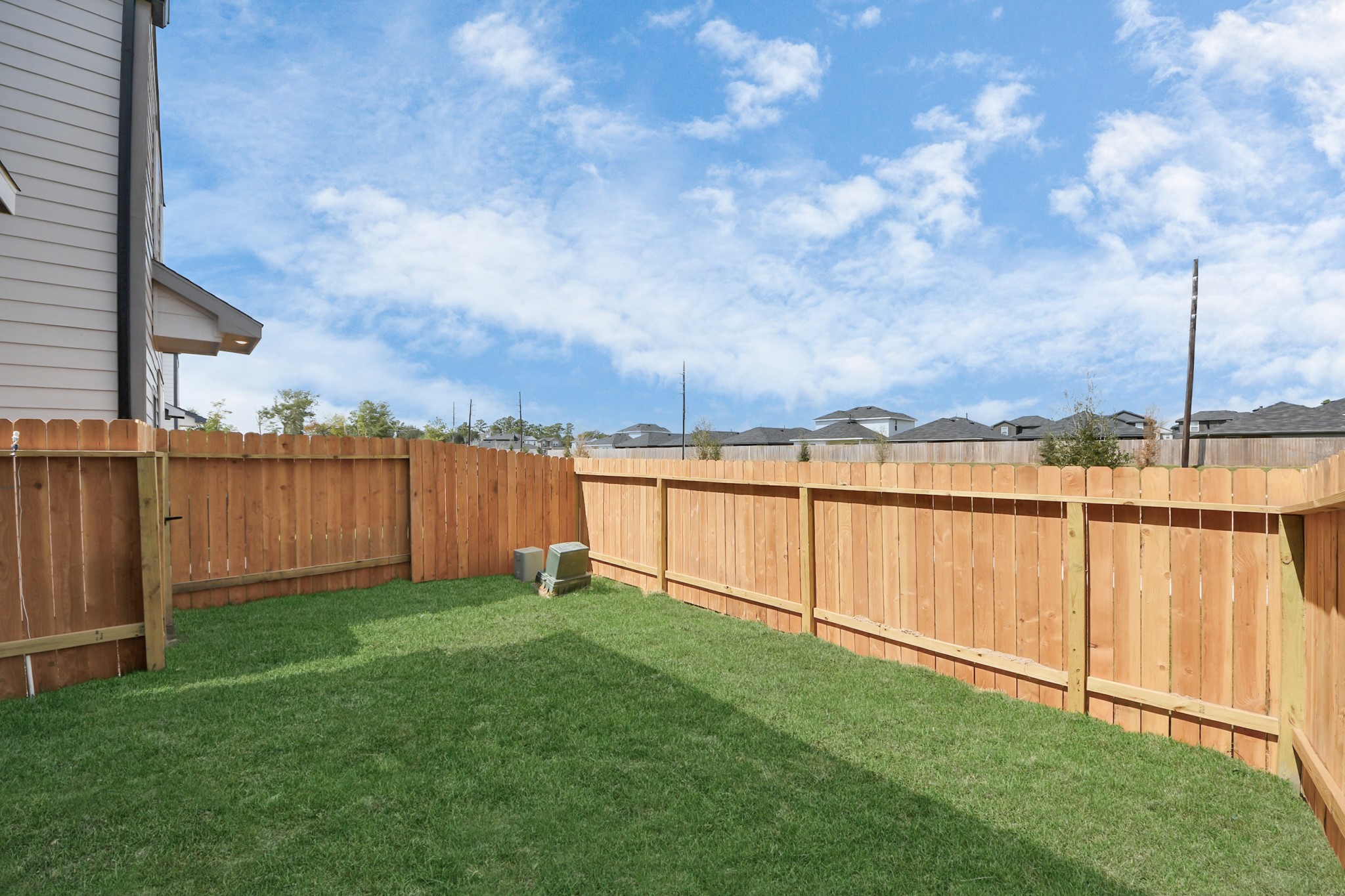 1006 Moon Drop Lane Houston, TX 77090 - Photo 33 of 38 a view of a field with sitting area