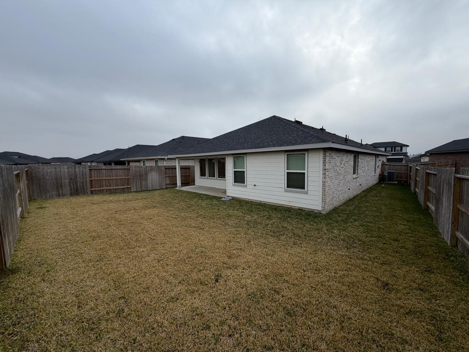 5111 Hunters Trail Fresno, TX 77545 - Photo 16 of 16 a view of a house with a yard