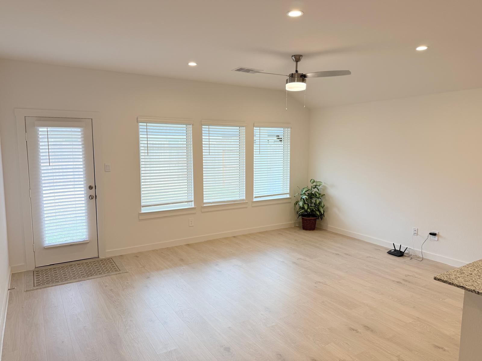 5111 Hunters Trail Fresno, TX 77545 - Photo 6 of 16 a view of an empty room with a window